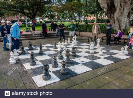 men-playing-giant-chess-in-hyde-park-sydney-2BKC7HP.jpeg
